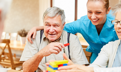 a group of residents having a nice time at a residential aged care facility