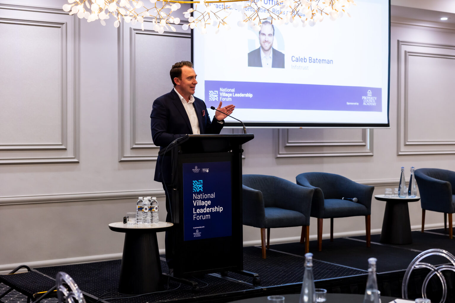 Caleb Bateman of Infotrust presenting on AI in the village office at the National Village Leadership Forum